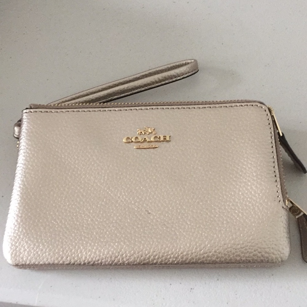 NWT Coach gold wristlet